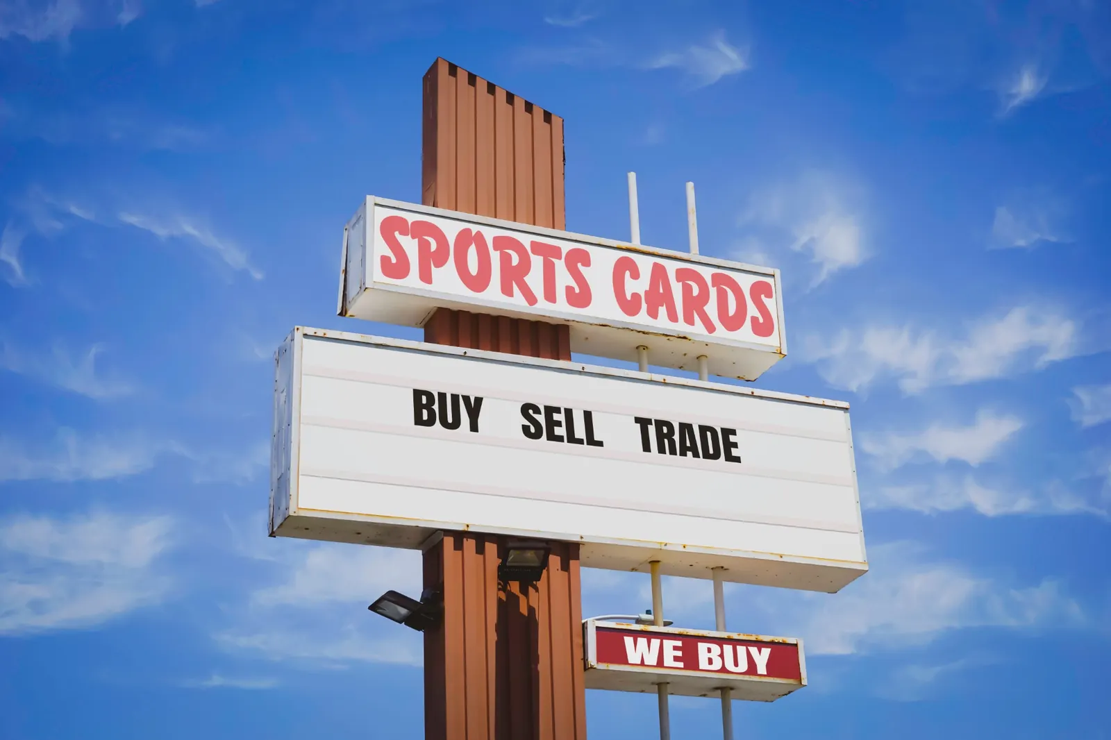 Vintage sports card shop sign advertising buying, selling and trading